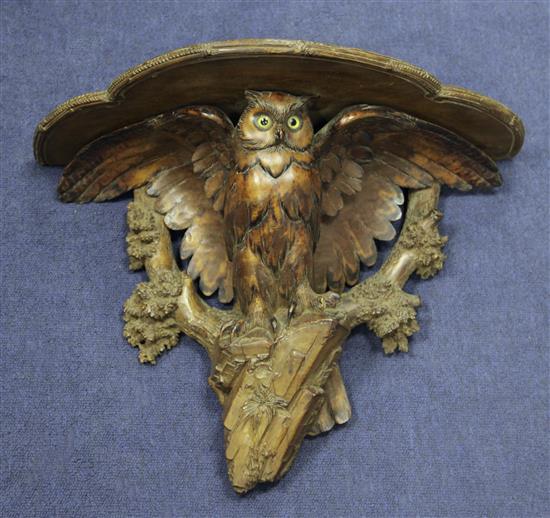 A late 19th / early 20th century Black Forest carved wall bracket, 20.5in.
